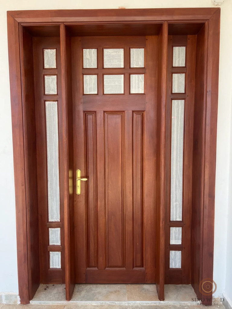 Hardwood door with glass side panels