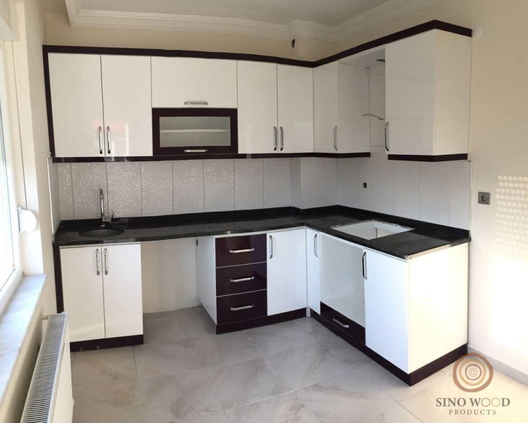 L-Shape White Kitchen with Dark Accents