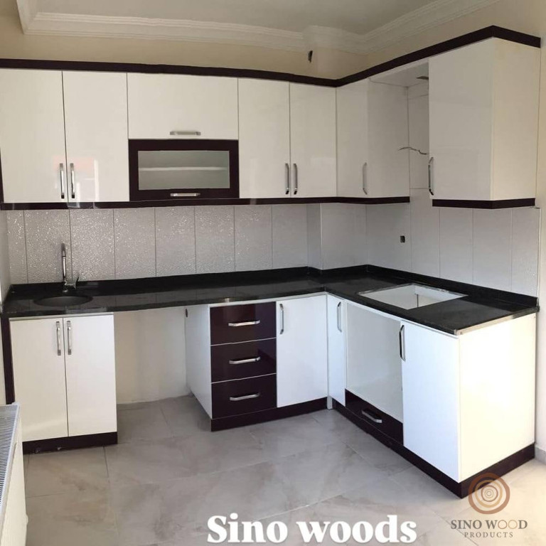 L-Shape White Kitchen with Dark Accents