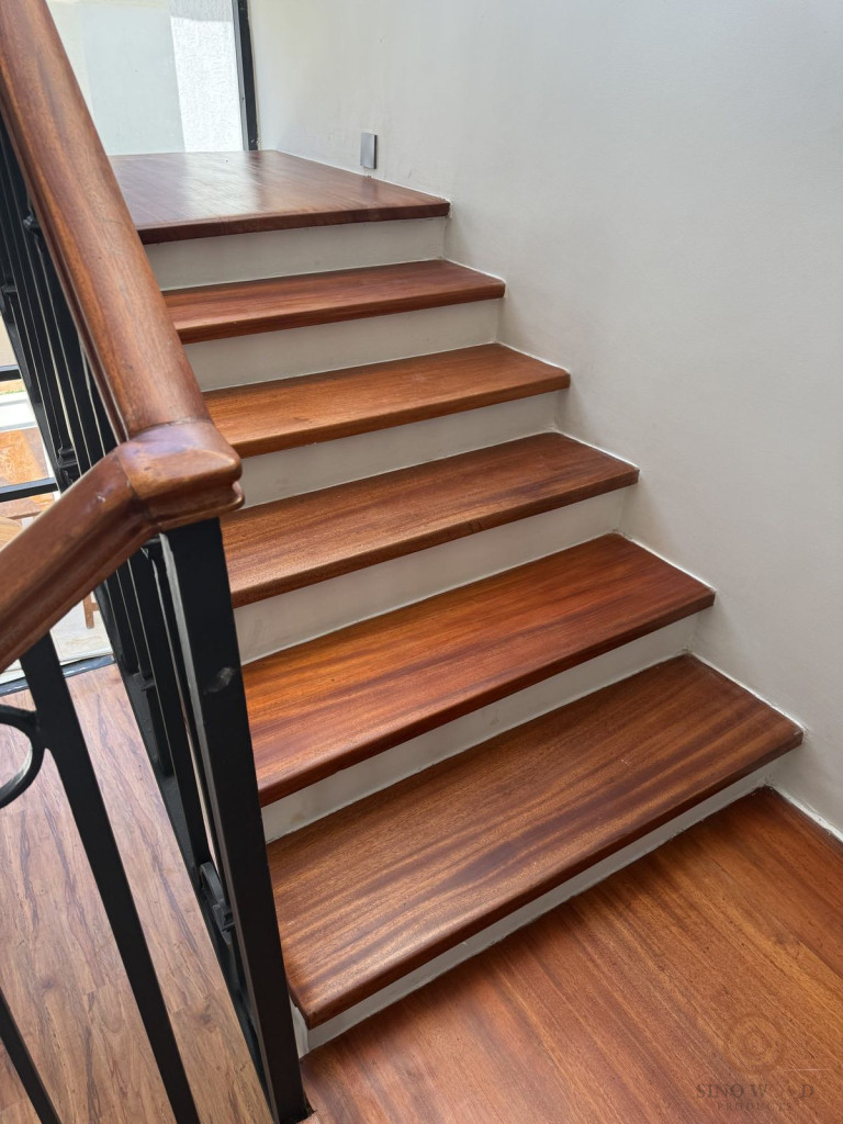 Mahogany Staircase with Wrought-Iron Balustrade