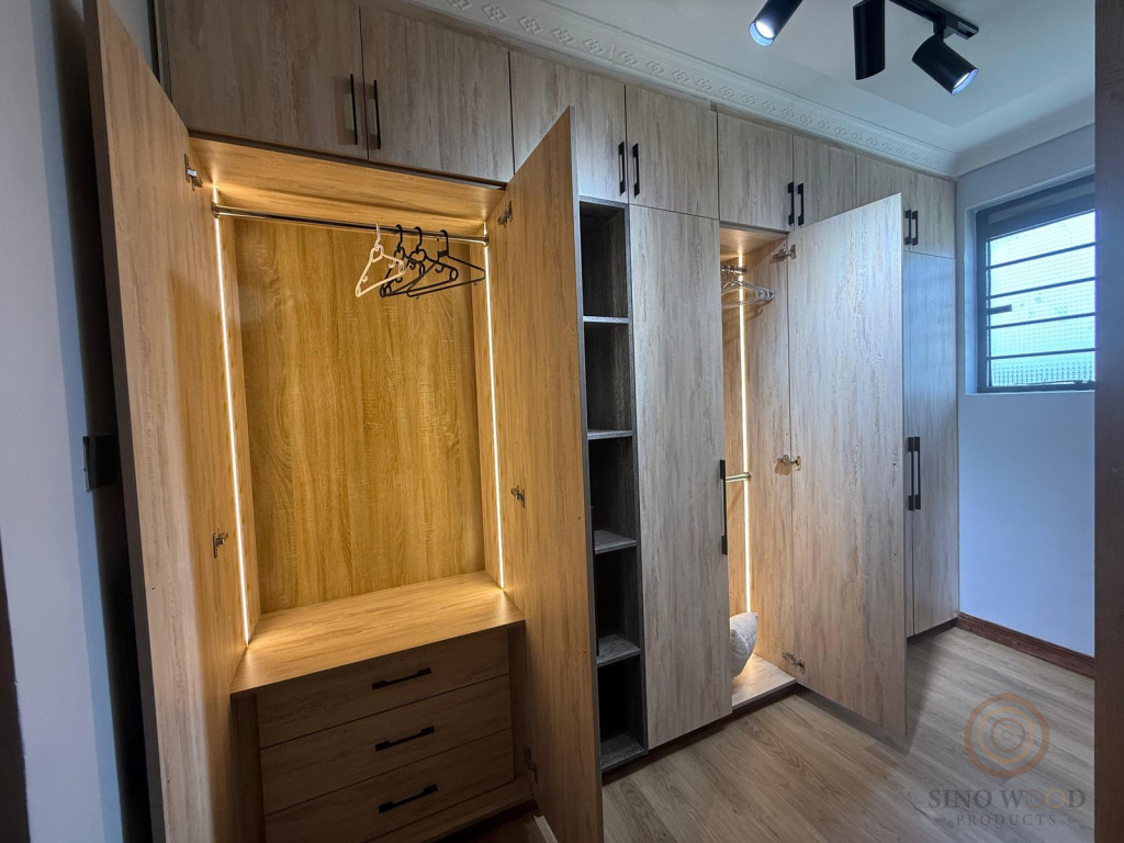 Built-in wardrobe with LED lighting, hanging rail and drawers